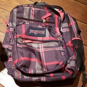 Pink and gray jansport bookbag